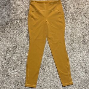 Lululemon Swift Speed High-Rise Legging in a gold